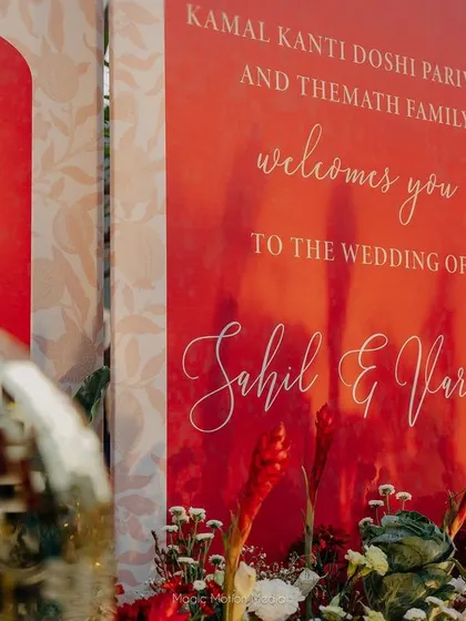 A close-up of the elegant calligraphy on the welcome sign.