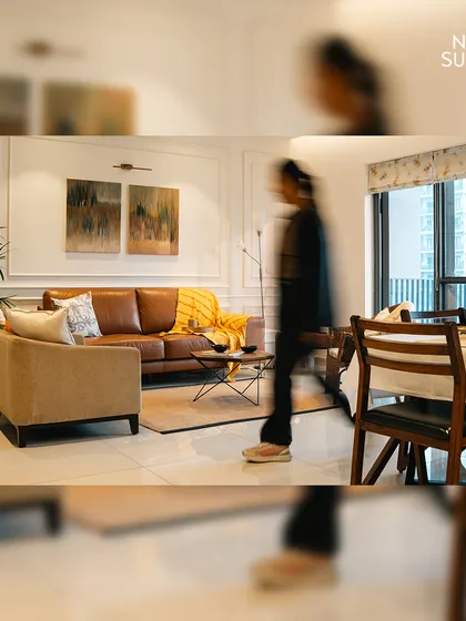 A motion-blur shot captures the dynamic nature of the living space. The design is both elegant and practical, created to accommodate the daily life of a family.