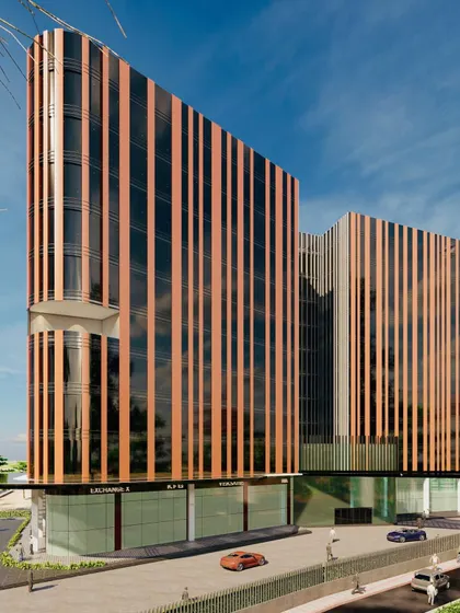 A street-level view of the Grade A business building concept. The design's verticality and material choices are intended to create a sophisticated and sustainable landmark on the Noida-Greater Noida expressway.