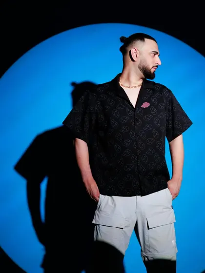 Call me Bluetooth, because I stay connected to the vibe. A cool shot against a blue backdrop from a recent photoshoot.