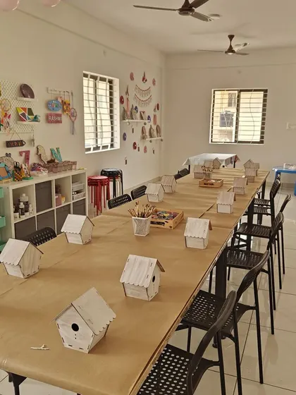 The calm before the creative storm! Our studio is prepped with individual birdhouse kits, ready for a fun-filled birthday party where every child gets to be an artist.