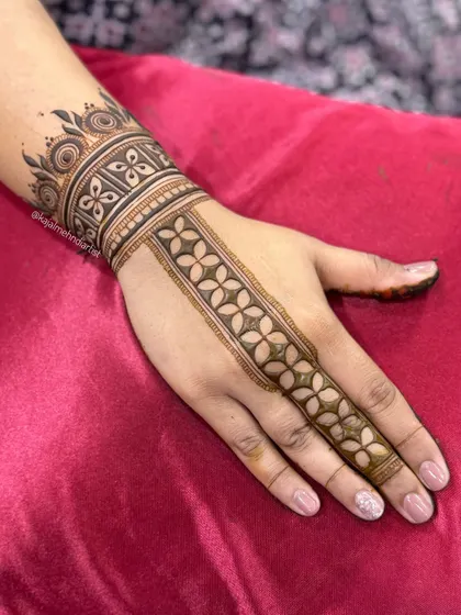 The stained version of the geometric floral henna, showing the lovely color it develops into.