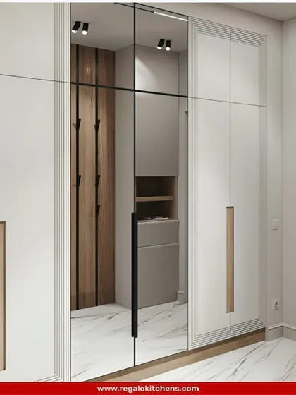 A practical and stylish entryway wardrobe with a full-length mirror. We included open hooks and shelving for quick access to coats and shoes.