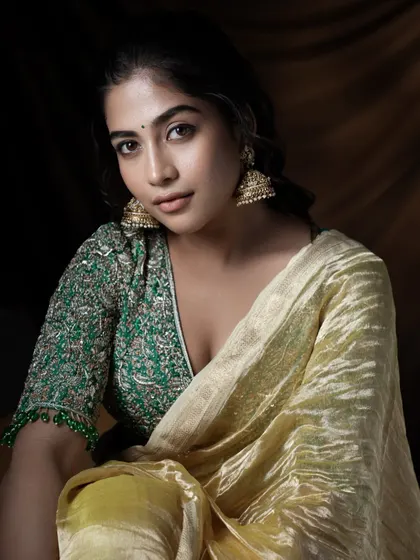 A beautiful portrait of actress Sampada. The makeup is a classic 'no-makeup' look, perfect for photoshoots and public appearances.
