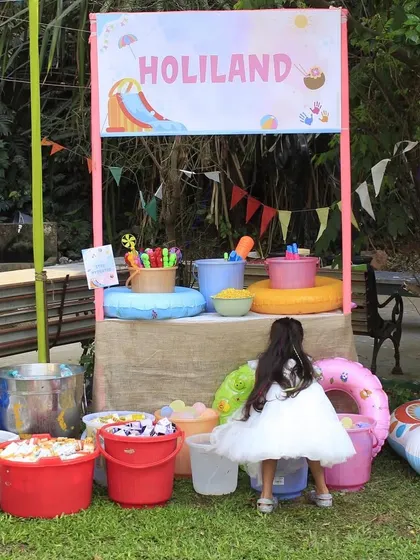 The 'Holiland' station at the kids' party, where little ones could pick up their game prizes like water guns and floats.
