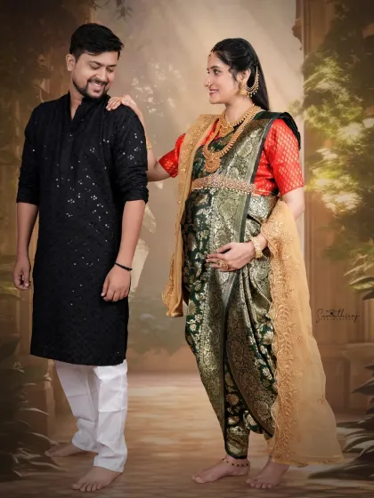 A playful and loving candid moment captured during a traditional shoot. The authentic connection between the couple shines through, highlighting the joy of their journey to parenthood.