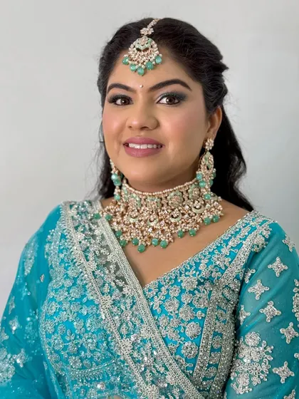 A close-up portrait showing the beautiful blend of the shimmery eyeshadow and the flawless base.