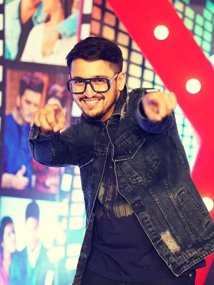 Capturing moments, one verse at a time. This playful shot from a TV set is a fun throwback in my journey as a performer.