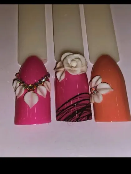 These are 3D nail art demonstration pieces I created for my students at Lakme Academy. They showcase different techniques for sculpting flowers and leaves with acrylic.