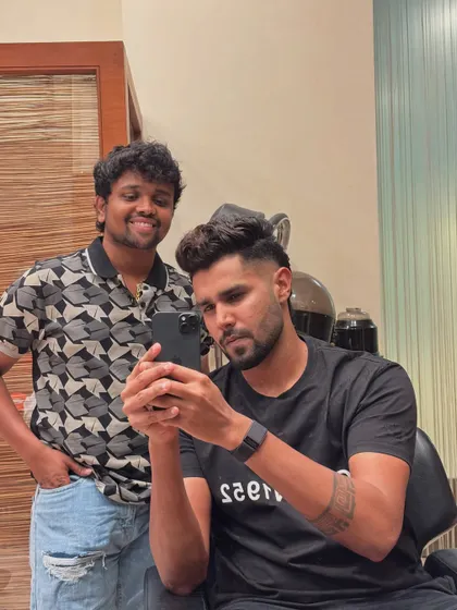 A selfie with Harshit Rana, checking the details of his mullet.
