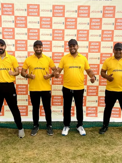 Posing with colleagues during our law firm's cricket league.