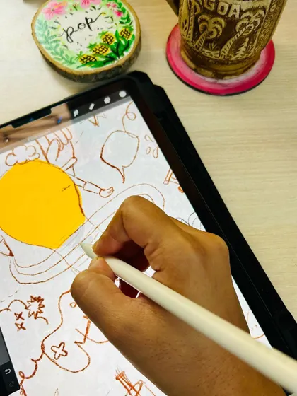 The creative process often starts with a digital sketch. Here's a peek at me designing the coffee-themed mural for Dhruva Advisors on my tablet before taking it to the wall.