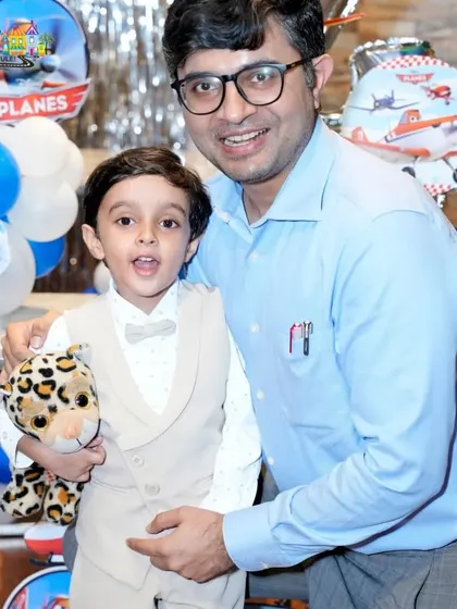 A proud dad with his son on his birthday. These are the heartwarming moments I love to see.