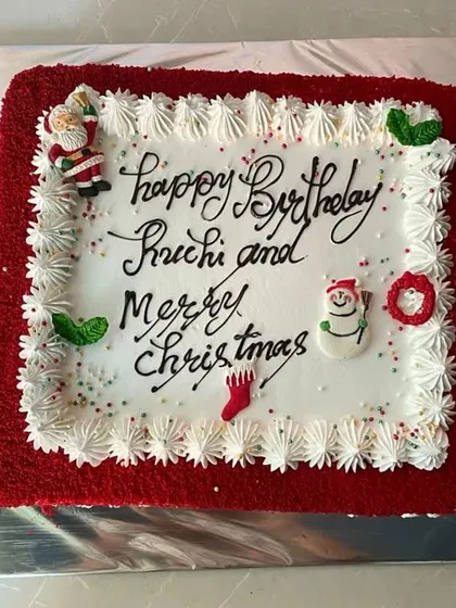 A red velvet sheet cake for a combined birthday and Christmas celebration. We can always customize our cakes for your specific event.