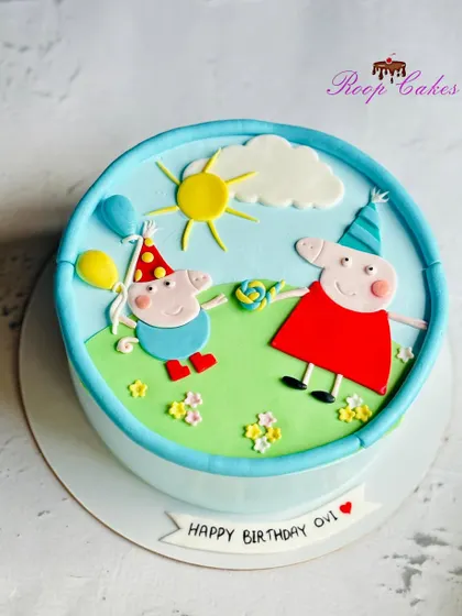 A cheerful Peppa Pig-themed birthday cake to celebrate a special day, featuring Peppa and George enjoying a sunny day.