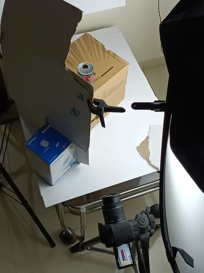 The simple, DIY setup for the Hell energy drink product shot, using cardboard as a reflector to control the light.