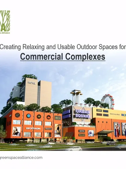 A render of a commercial complex featuring a hotel and a mall with a rooftop Ferris wheel. Our landscape design for such projects focuses on creating usable and relaxing outdoor spaces that enhance the visitor experience and add value to the property.