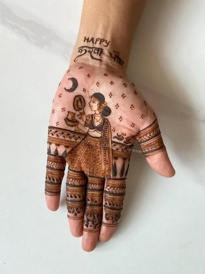 A close-up of the Karwachauth figure work. The detail in the woman's attire and the ritual elements is a testament to my love for storytelling.