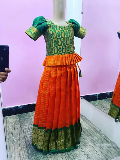 A traditional paavada blouse set for kids, made from a classic pattu saree. I focus on making these comfortable for children while keeping the rich look.