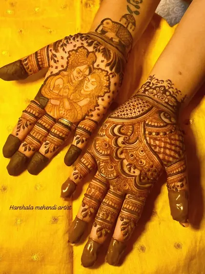 A special design for the festival of Karwa Chauth. One hand features a classic portrait of Radha and Krishna, while the other is adorned with intricate traditional patterns.