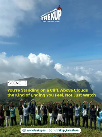 Scene 3: You are standing on a cliff, above the clouds. Our group creating a heart shape with their hands, sharing a beautiful moment at the summit.