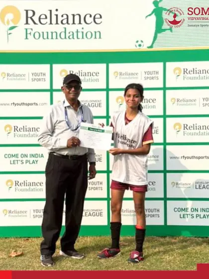 Surishti Rozario receives the Player of the Match award after scoring a goal in Somaiya FC's 2-0 win in the Reliance Foundation Youth Sports U-17 Tournament.