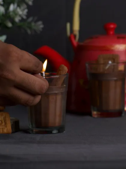 Lighting up my 'Chai Biscuit' candle, which smells just like cardamom tea.