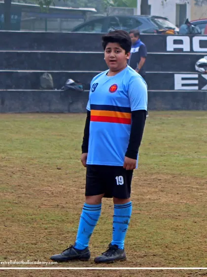 A portrait of one of our players on the field during a Golden League game. Each player is an important part of our academy's journey.