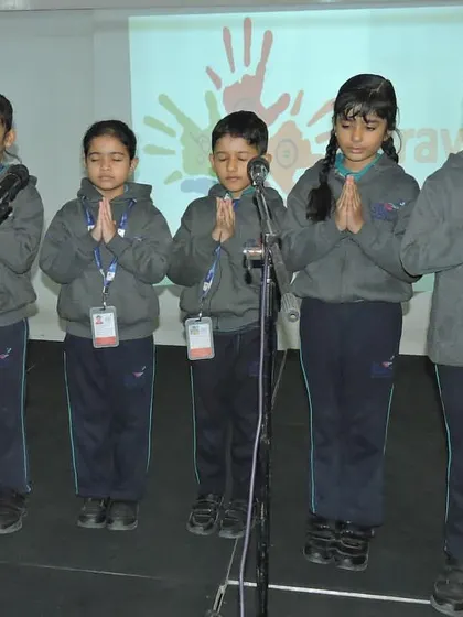 Students lead the morning prayer during a special assembly for International Disability Day, setting a tone of empathy and respect.
