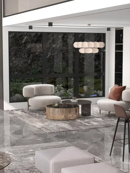 A modern living area with a bar corner and plush, contemporary seating, showcasing our ability to design for entertainment and leisure.