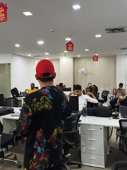 Leading an office session from the front. I ensure every participant understands the movements and their benefits, fostering an environment of learning and collective well-being.