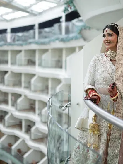 Another beautiful balcony shot, showing her full look from a different angle.