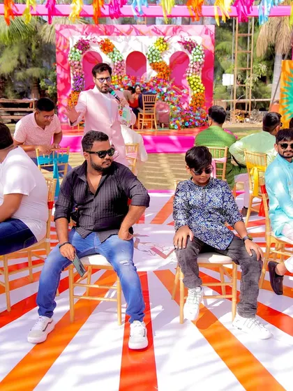 Getting ready for a game of musical chairs, a classic way to get guests of all ages involved and laughing.
