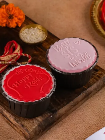 Our Rakhi cupcakes are a sweet surprise for your sibling. This set features "Happy Rakhi" and "Best Sis in the World" messages on our classic eggless cupcakes.