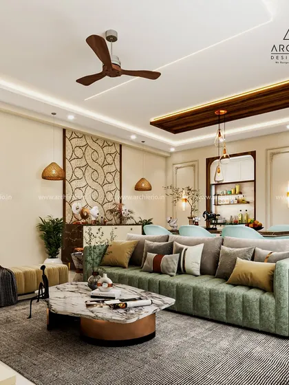 A sophisticated living room featuring a green channel-tufted sofa, a marble-top coffee table, and a statement mosaic art piece in the background.