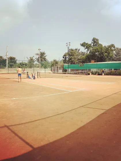 A wide view of the academy courts with multiple matches underway during the UTR Tour.