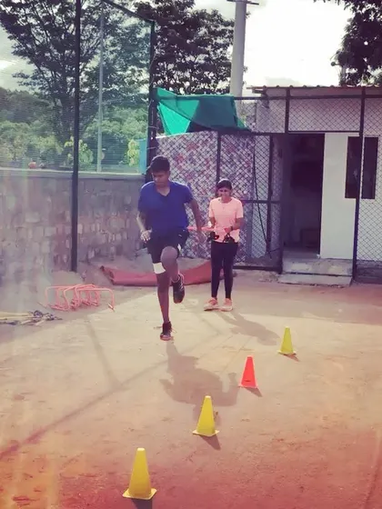 Two players perform running drills to build the stamina required for long matches.