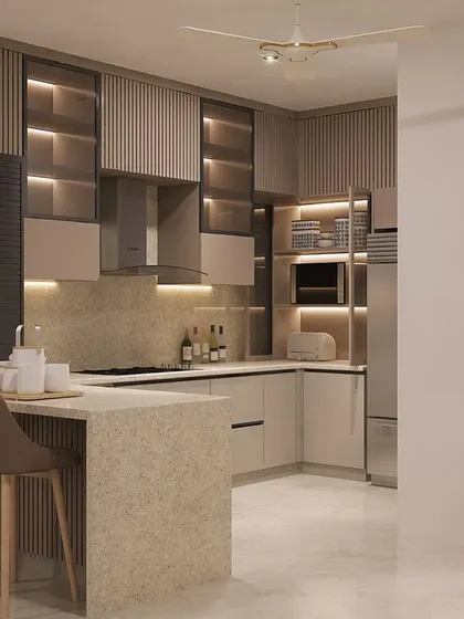 We believe kitchens must be both beautiful and highly functional. This modular kitchen design features a neutral palette, handleless cabinets, a breakfast bar, and smart lighting to make the space efficient and welcoming.