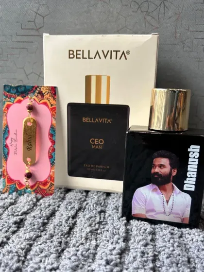 This image shows the complete set, including the Bella Vita CEO Man perfume box, the custom-printed bottle, and the name-engraved rakhi.