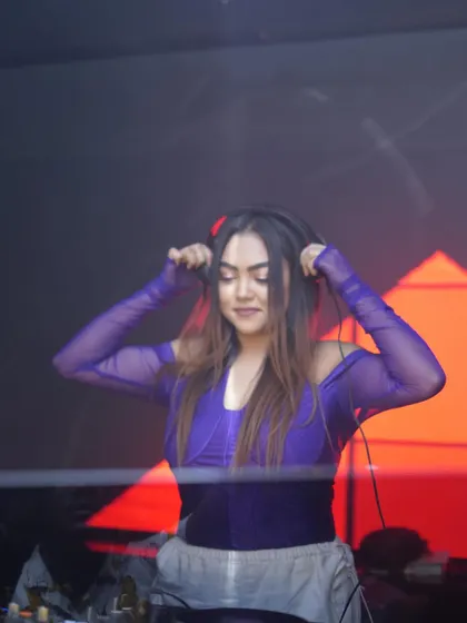 Putting on my headphones, getting ready to dive into the mix.