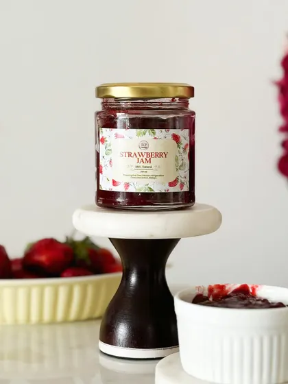 Sunshine in a jar! Our homemade strawberry jam is bursting with freshness and flavor, made with real fruit and no artificial preservatives or colors.