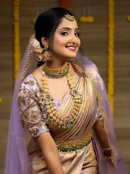 A gorgeous series of a model in a light purple saree, wearing our kemp stone bridal set. These photos show the jewellery from various angles, highlighting its beauty.