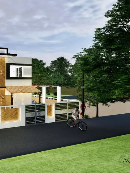 This view shows the home's relationship with the street, featuring a thoughtfully designed compound wall and gate that complements the main structure's modern-traditional aesthetic.