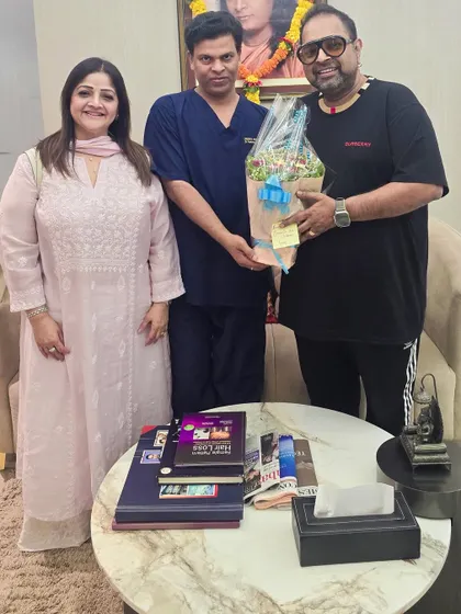 Presenting a bouquet to Shankar Mahadevan ji and his wife. I am deeply grateful for their friendship and the divine grace they bring into our lives.