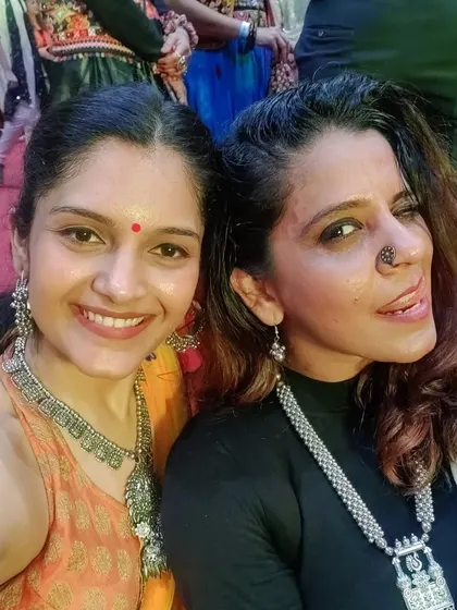 A happy moment with a friend during Navratri. The festival is about community, connection, and celebrating together through dance.
