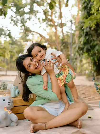 Another beautiful, playful moment from their mother-daughter picnic session. These are the memories that will be cherished for years.