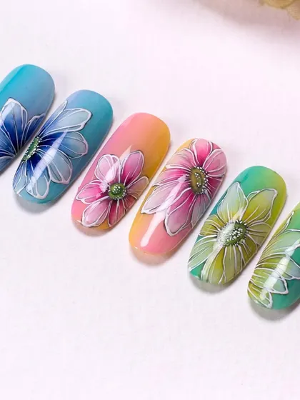 A still shot of the colorful gel-painted flowers. The blending of the background colors makes the flowers pop.