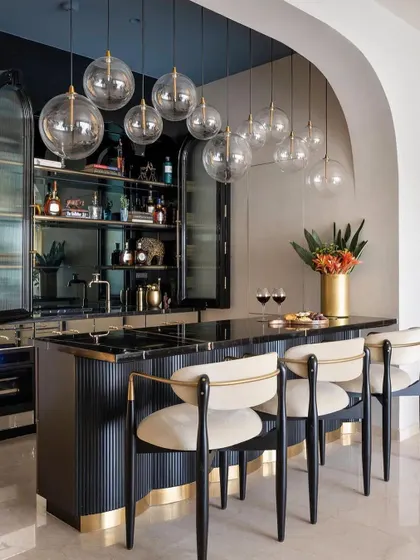 A closer look at the sophisticated bar area, highlighting the elegant design of our bar stools and how they integrate with the overall art-deco-inspired aesthetic.