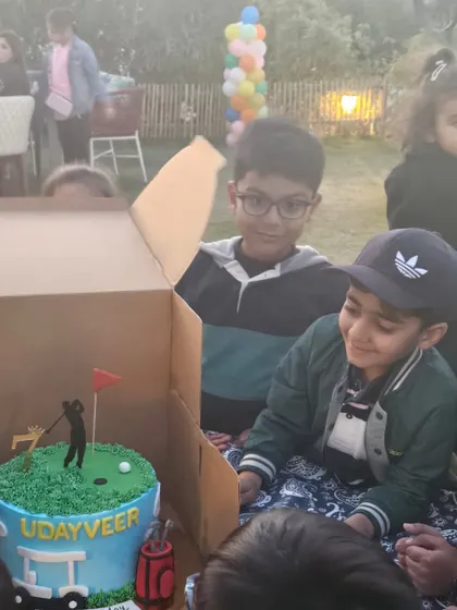 The big reveal of a custom golf-themed birthday cake for Udayveer. I work with you to add those personal touches that make the celebration truly special.