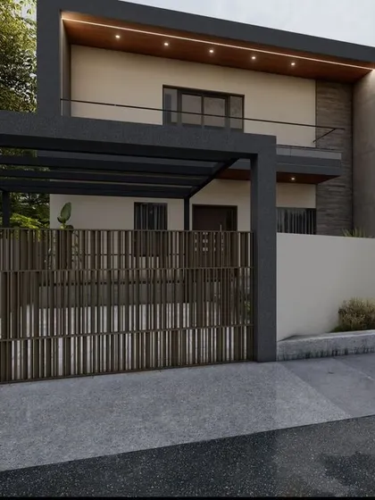 This house design features a unique slatted gate and a covered carport. The mix of materials and textures on the facade gives the home a contemporary and stylish appearance.